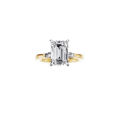 18ct EF VS laboratory grown diamond side baguette ring with a emerald cut diamond in a classic claw setting