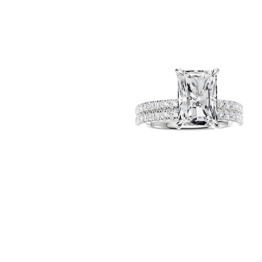 PT EF VS laboratory grown diamond french pave ring with a radiant cut diamond in a classic claw setting and a matching wedding band