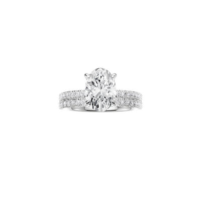 PT EF VS laboratory grown diamond french pave ring with a oval cut diamond in a classic claw setting and a matching wedding band