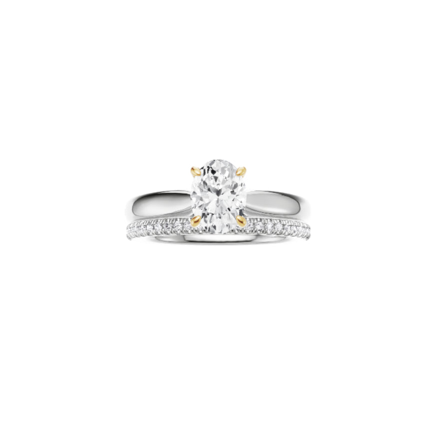 18ct EF VS laboratory grown diamond plain ring with a oval cut diamond in a classic claw setting and a matching wedding band