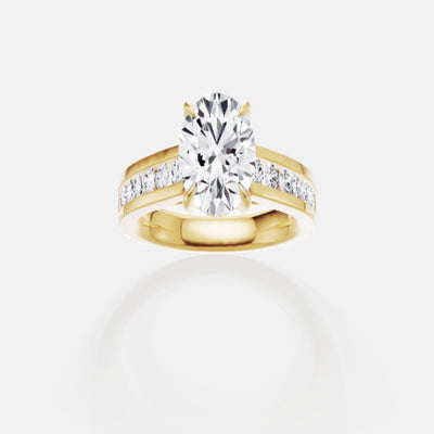 18ct EF VS laboratory grown diamond channel ring with a round brilliant diamond in a hidden halo setting
