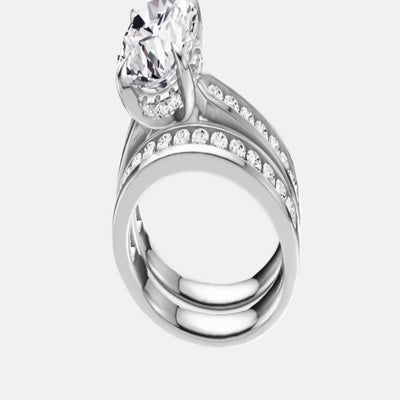 18ct EF VS laboratory grown diamond channel ring with a round brilliant diamond in a hidden halo setting and a matching wedding band