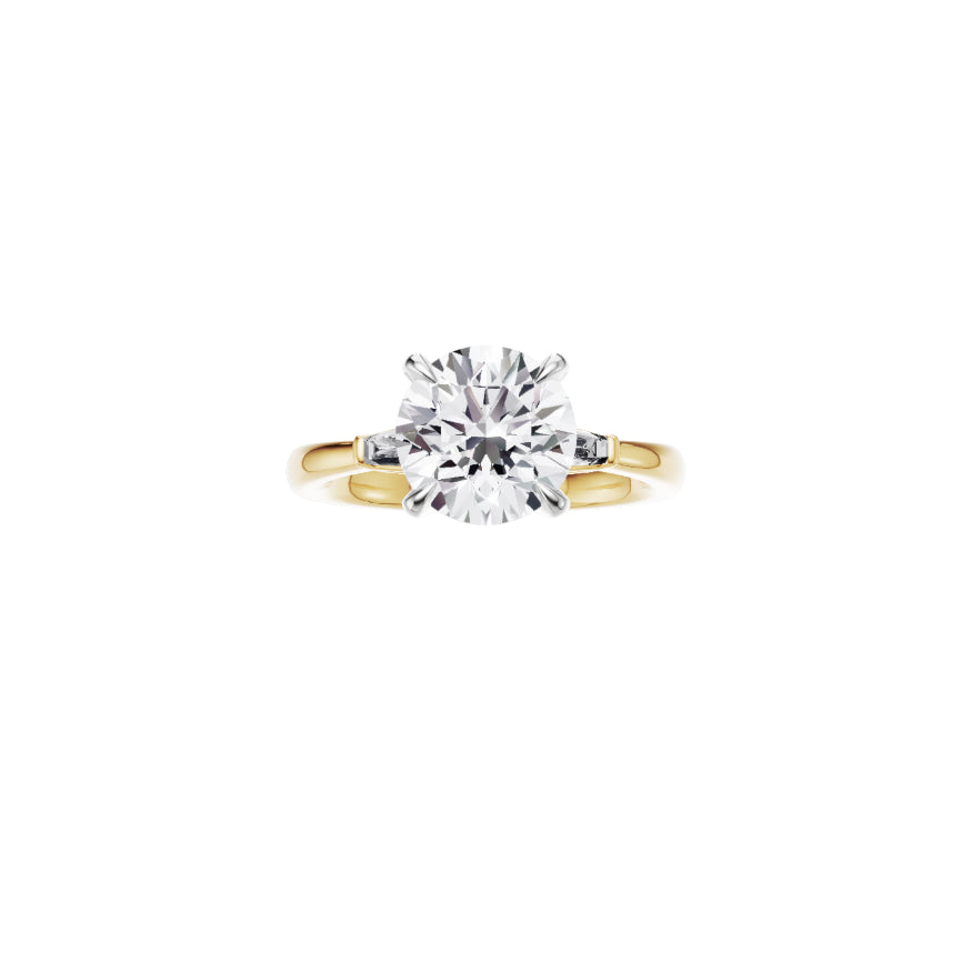 18ct EF VS laboratory grown diamond side baguette ring with a round brilliant diamond in a classic claw setting